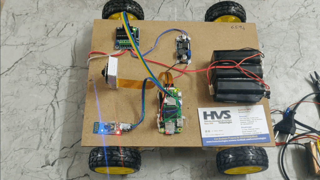 HVS-3603. Hand Gesture and Voice control 4-wheel robot using Raspberry pi and pi camera