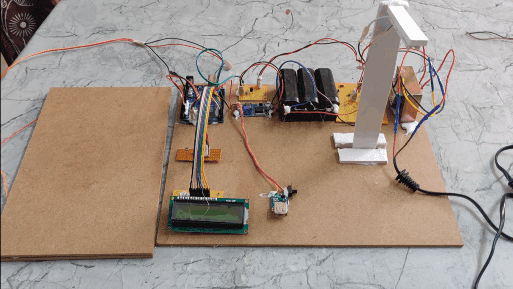 HVS-3547. Piezo Electric Power Generation Using Arduino for mobile charging and automatic street light