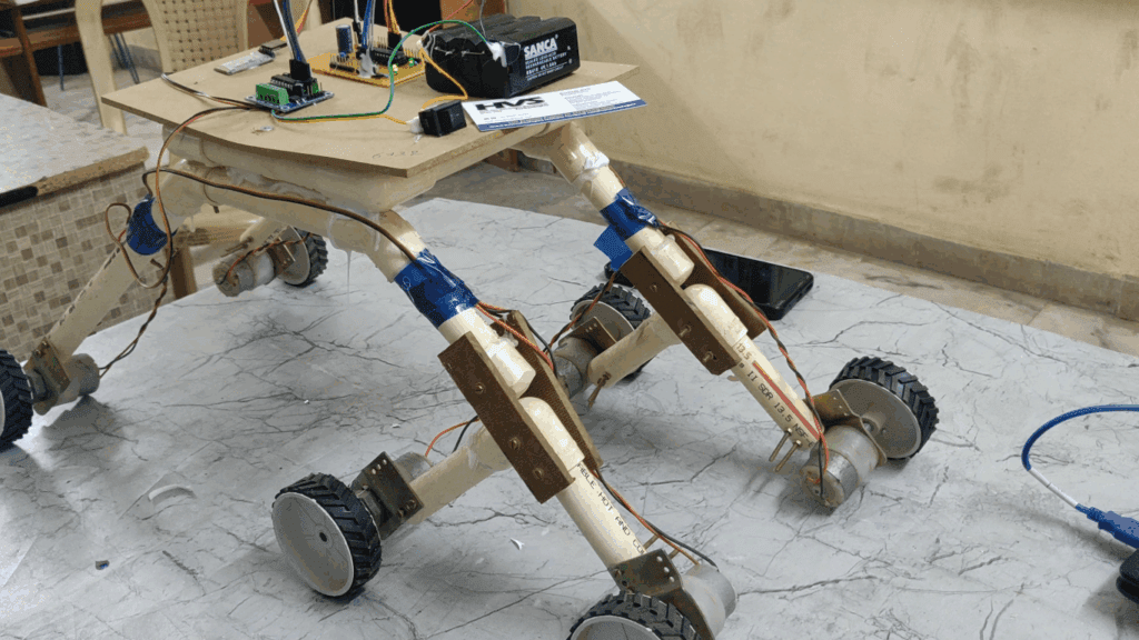 HVS-4529. Rocker-Bogie : Mars Rover : Android Bluetooth Controlling using PIC Micro-controller.