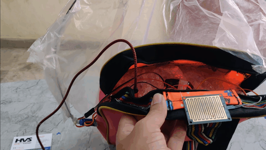 HVS-4539. Rain Sensing Motorized Umbrella Bag mounted.