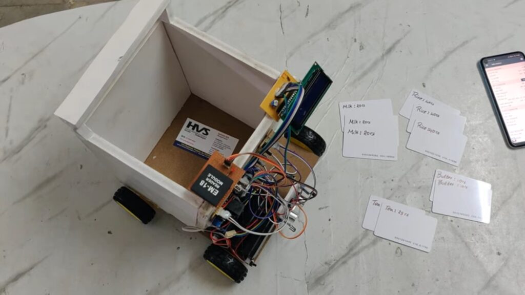 HVS-4717.IoT based Automatic Human Following Trolley with Smart Billing System and Webpage Monitoring