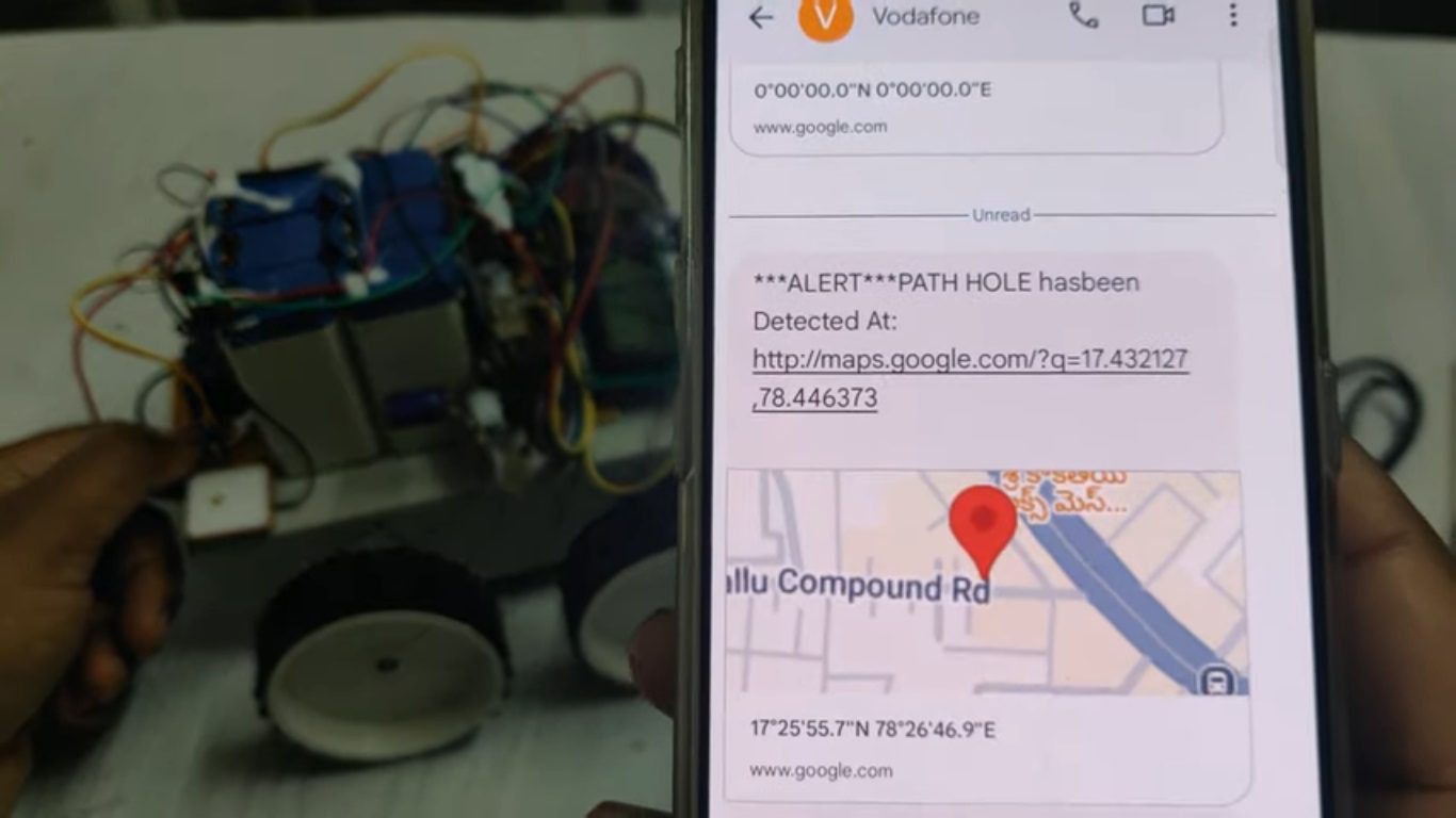 HVS-4738. Automatic Detection and Notification of Path Holes, Humps to aid Drivers with Image Capture, SMS