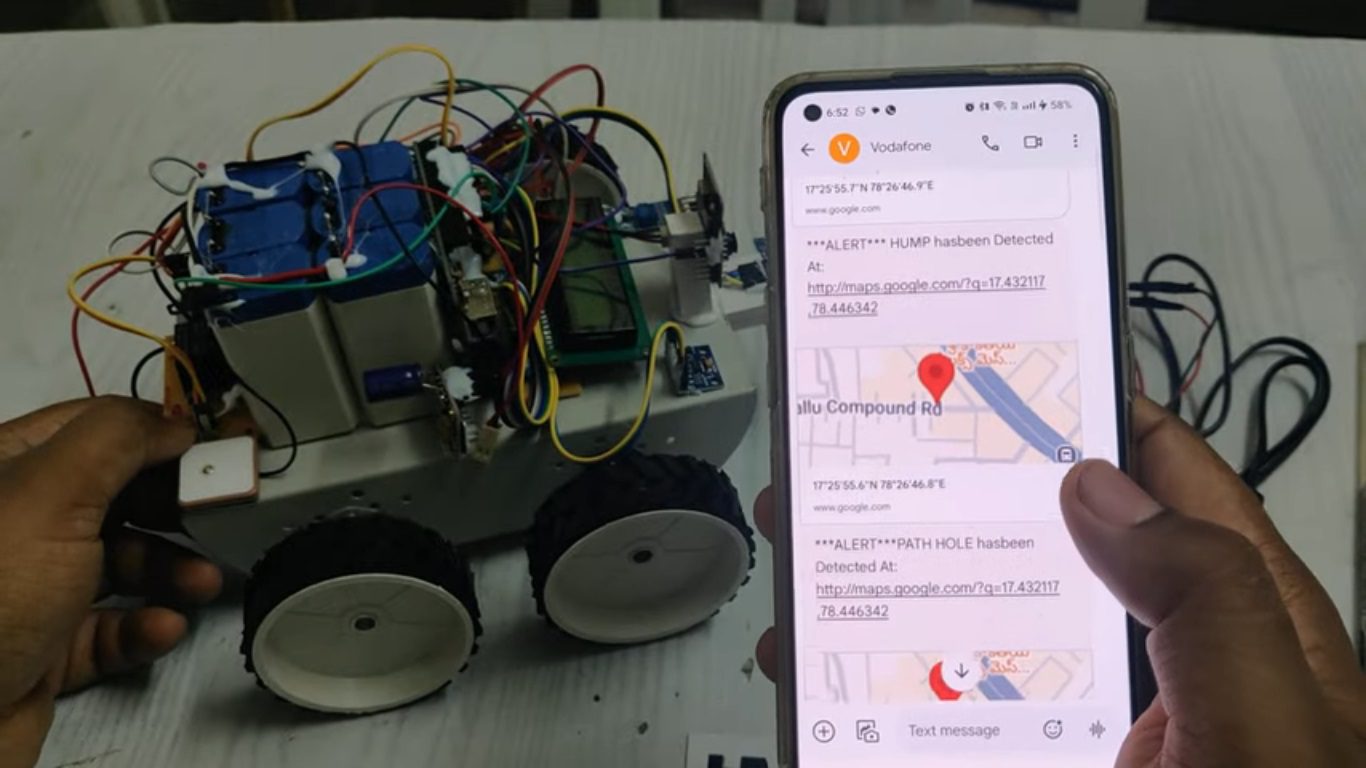 HVS-4738. Automatic Detection and Notification of Path Holes, Humps to aid Drivers with Image Capture, SMS