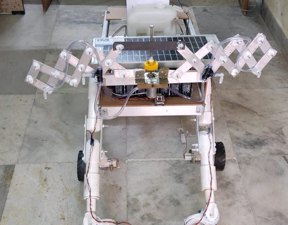 HVS-4919. Solar Powered Automated Multi-Purpose Robot- Rocker bogie mechanism, scissors mechanism, seed drop