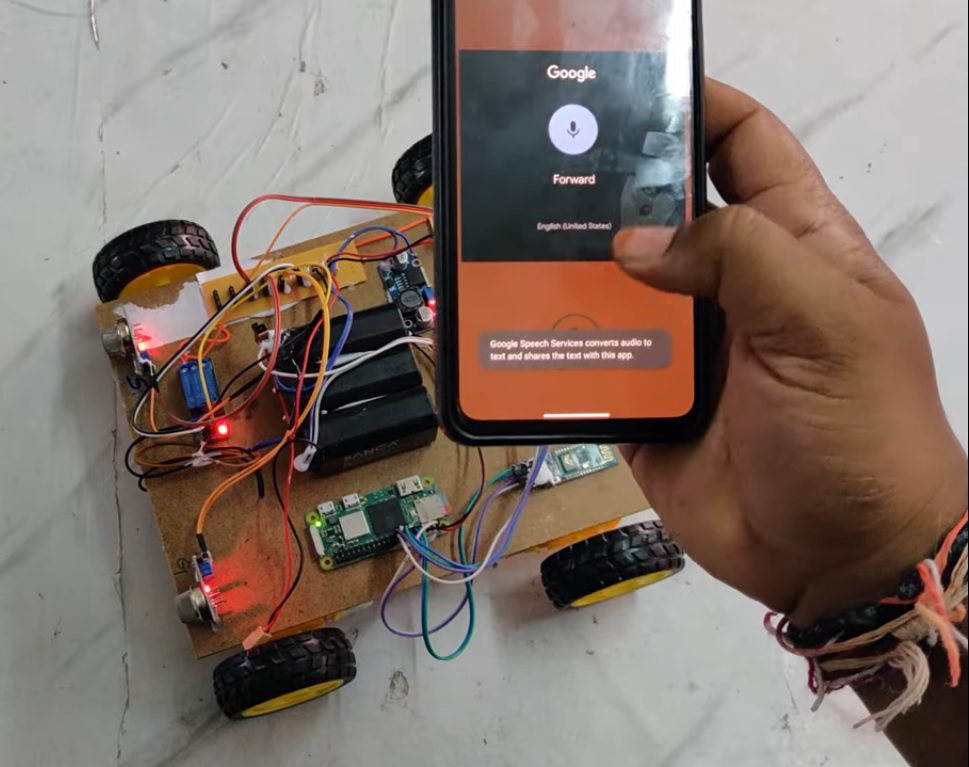 HVS-4907. Hand Gestured and Voice Control Four Wheel Robot 🤖 using Raspberry Pi with Gas,Smoke and metal