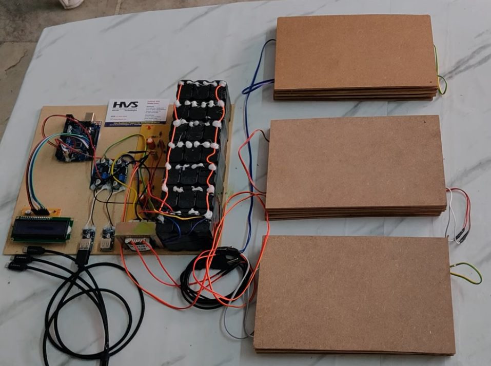 HVS-5025. Foot Step Power generation using Piezoelectric Plates and Mobile charging Station