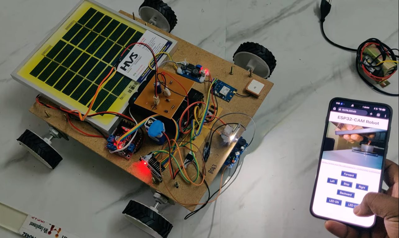 HVS-5041. Solar Power IoT-Based Web-Controlled Surveillance Robot with Live Streaming and Metal Detection