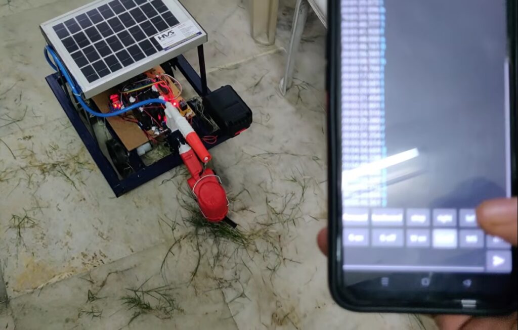 HVS-4989. Solar Grass cutter with pesticides sprayer using Bluetooth Controlling