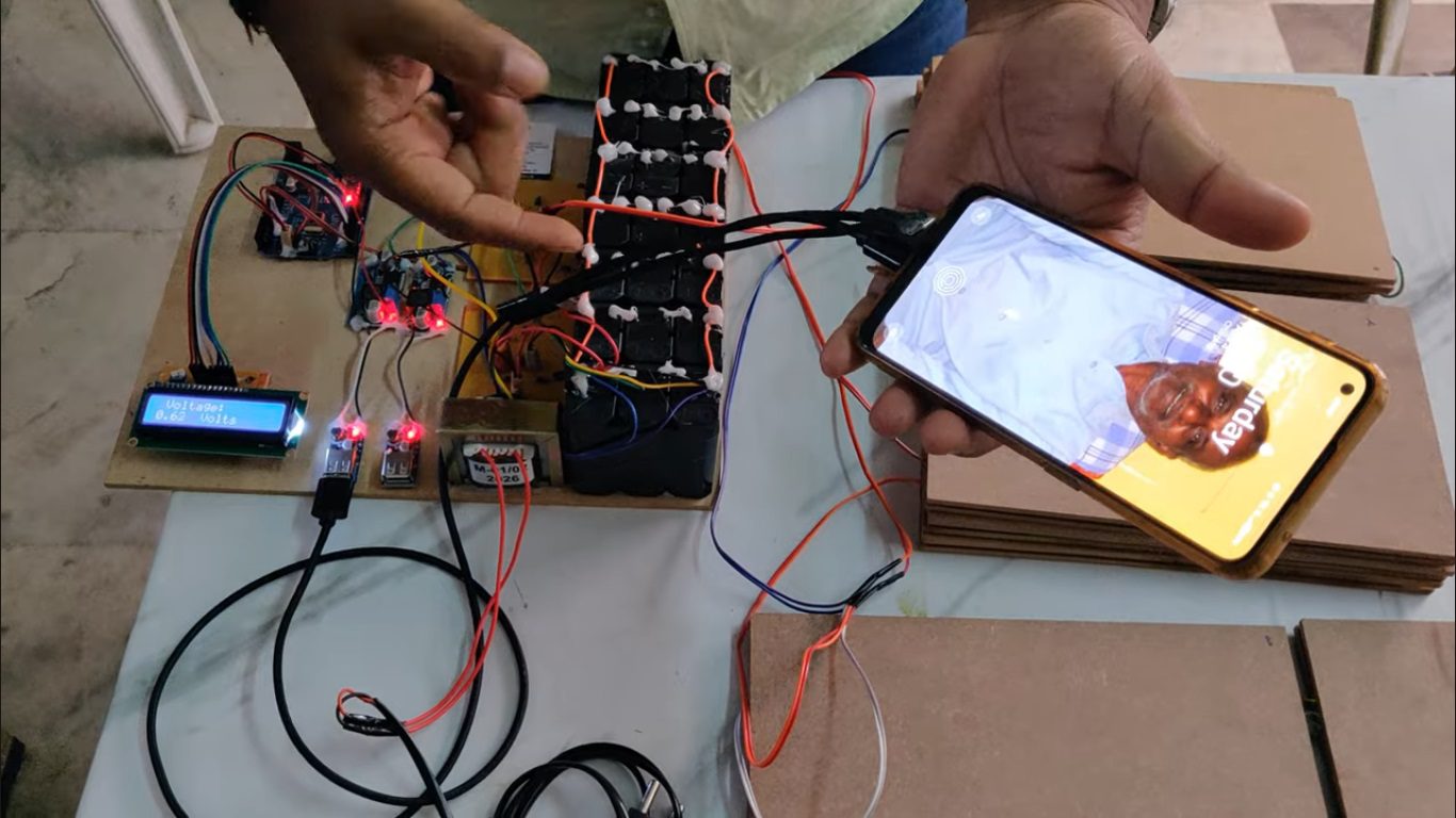 HVS-5025. Foot Step Power generation using Piezoelectric Plates and Mobile charging Station