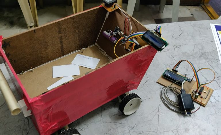 HVS-4310. Smart Shopping Trolley Using RFID and ZIGBEE.